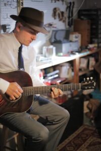 man playing guitar